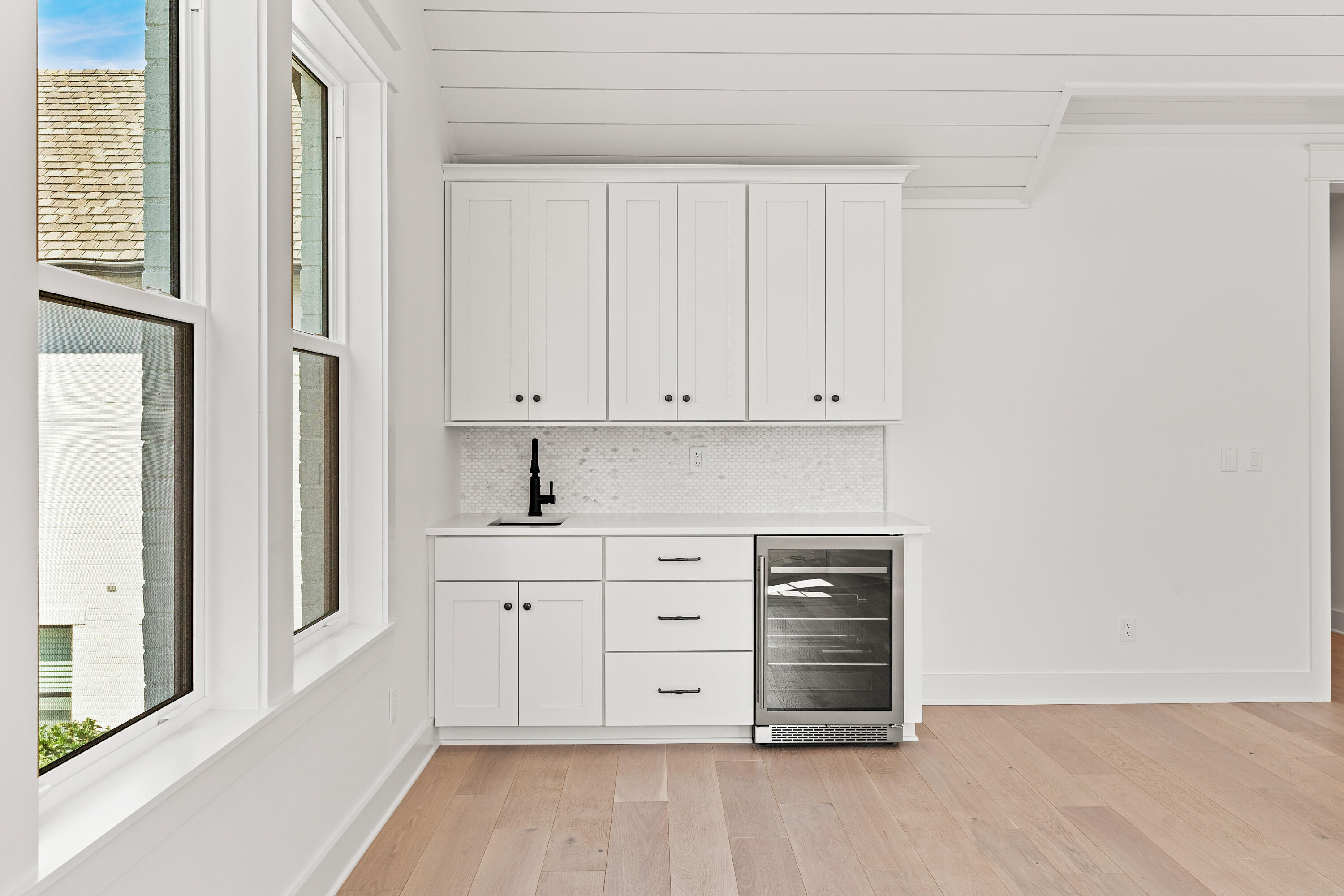 406 Ridgewalk Circle Santa Rosa Beach, FL 32459 - Photo 33 of 69 a view of cabinets and wooden floor