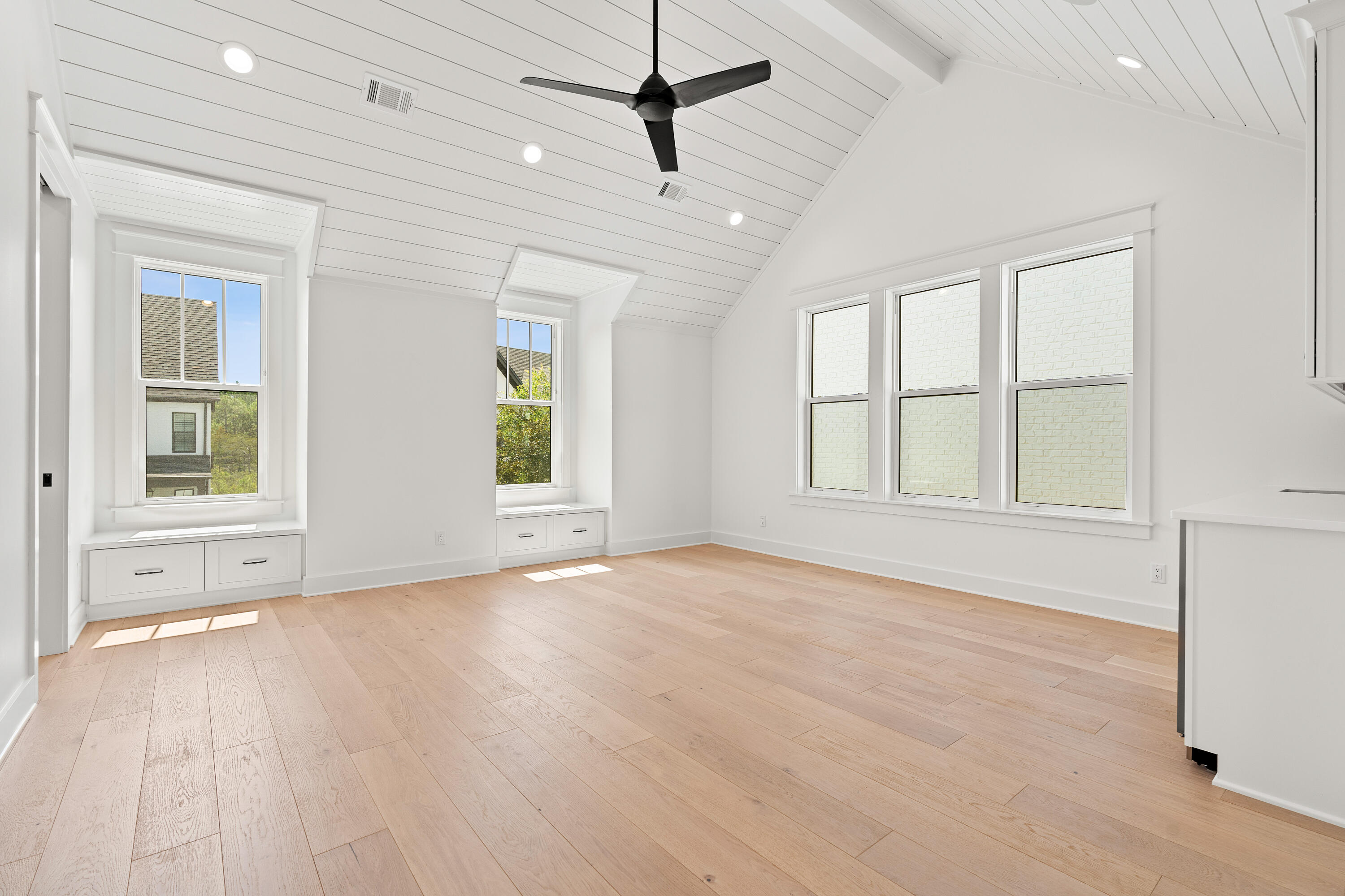 406 Ridgewalk Circle Santa Rosa Beach, FL 32459 - Photo 34 of 69 a view of an empty room with a window and wooden floor