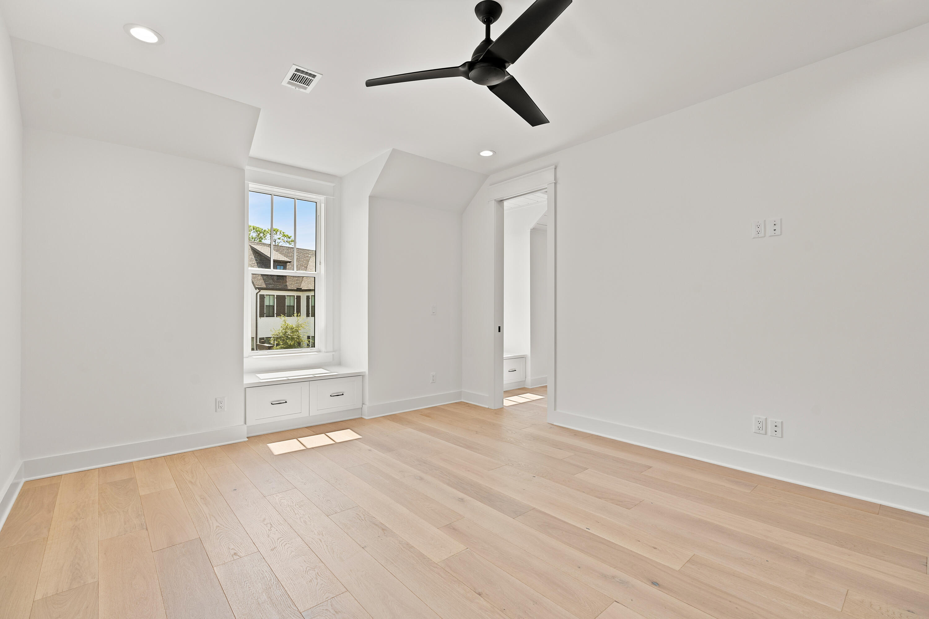 406 Ridgewalk Circle Santa Rosa Beach, FL 32459 - Photo 36 of 69 wooden floor in an empty room with a window
