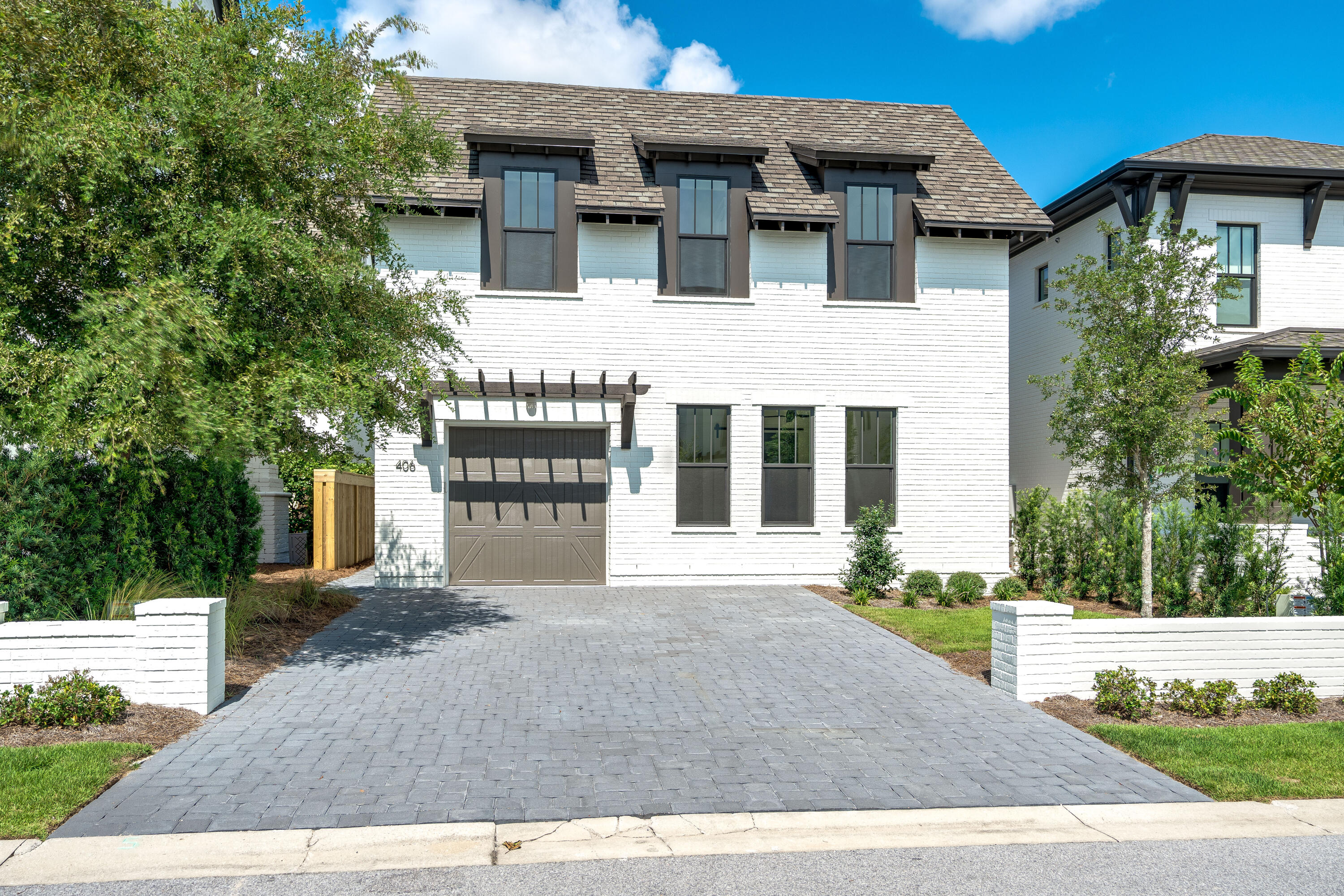 406 Ridgewalk Circle Santa Rosa Beach, FL 32459 - Photo 45 of 69 a front view of a house with a yard