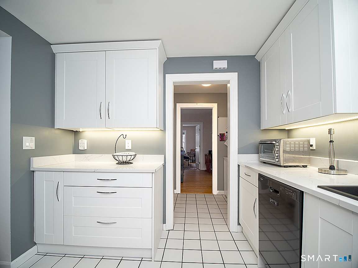 71 Vista Road North Haven, CT 06473 - Photo 12 of 32 a kitchen with a sink cabinets and appliances