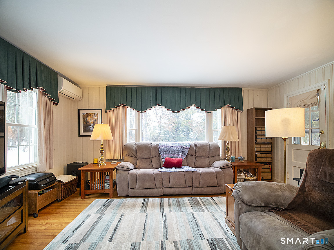 71 Vista Road North Haven, CT 06473 - Photo 15 of 32 a living room with furniture and a large window