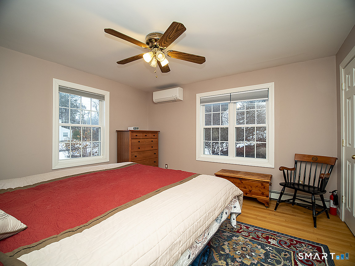 71 Vista Road North Haven, CT 06473 - Photo 16 of 32 a bedroom with a bed and a window