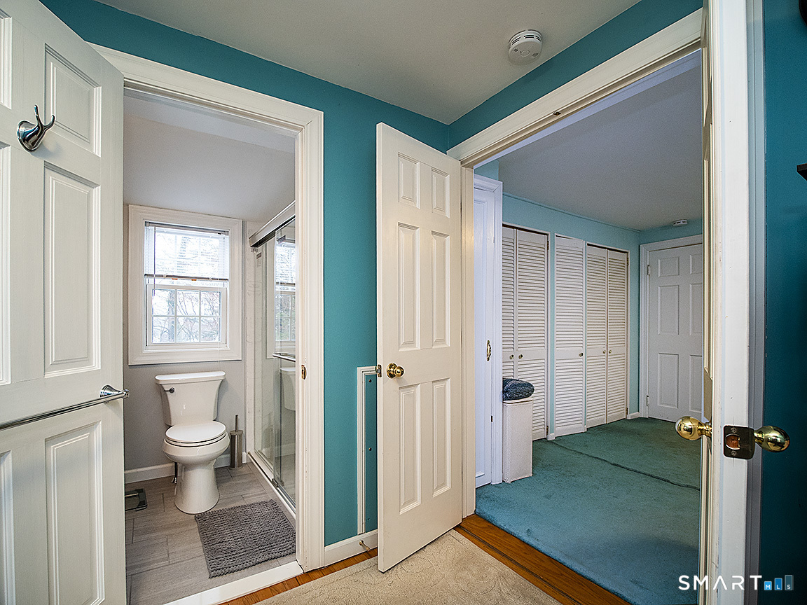 71 Vista Road North Haven, CT 06473 - Photo 21 of 32 a bathroom with a sink and a toilet