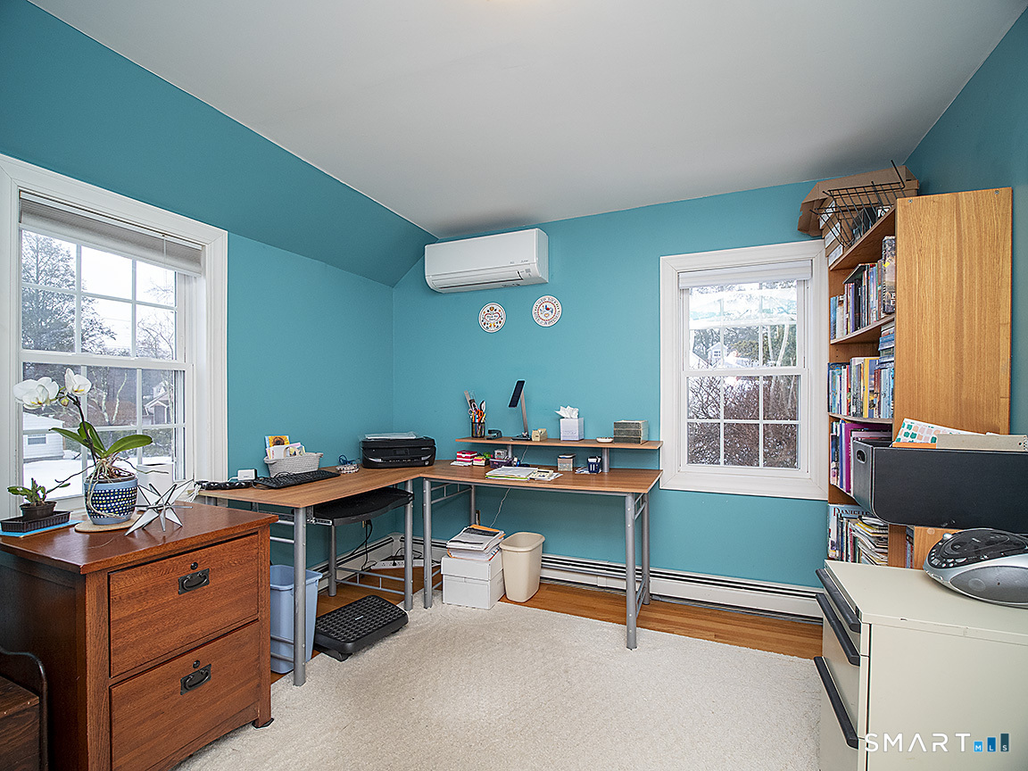 71 Vista Road North Haven, CT 06473 - Photo 22 of 32 a room with furniture and a window