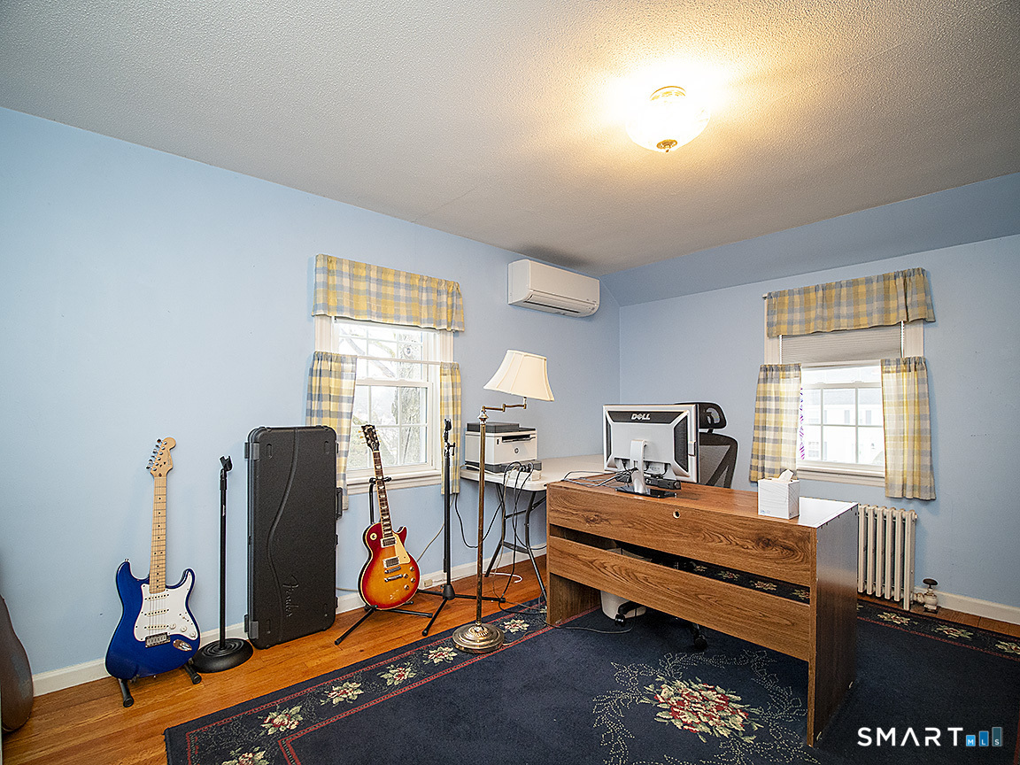 71 Vista Road North Haven, CT 06473 - Photo 25 of 32 a bedroom with furniture and a window