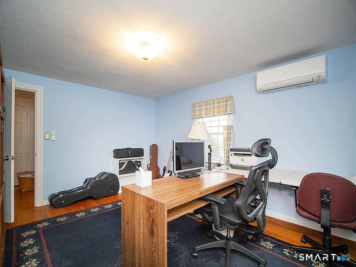 71 Vista Road North Haven, CT 06473 - Photo 26 of 32 a view of a workspace with furniture and a window