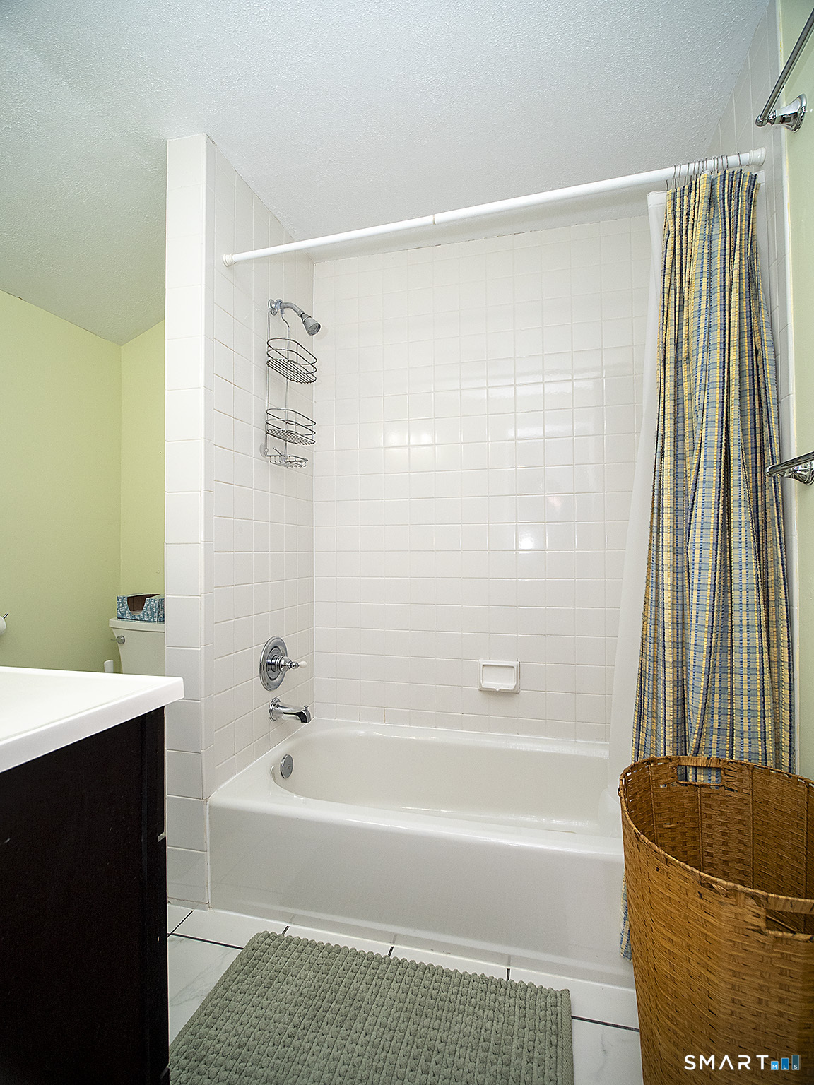 71 Vista Road North Haven, CT 06473 - Photo 29 of 32 a bathroom with a bathtub and a shower