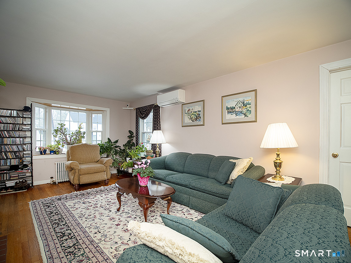 71 Vista Road North Haven, CT 06473 - Photo 7 of 32 a living room with furniture and a couch