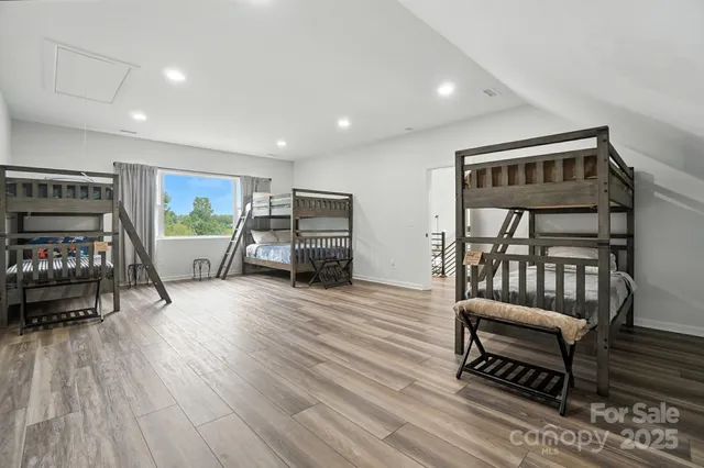a view of a lake with a yard and mountain view