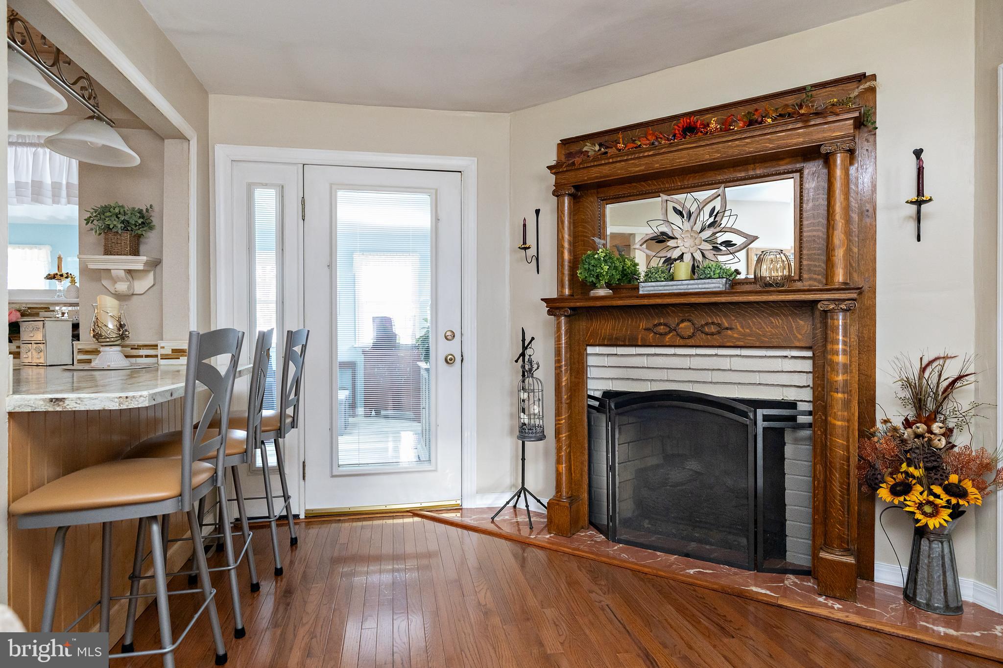 312 Croce Avenue Gibbstown, NJ 08027 - Photo 21 of 55 Door to sunroom and fireplace in family room
