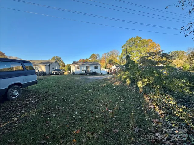 a view of a backyard with of the house