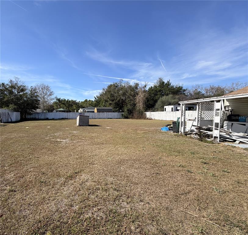 8156 North Princess Avenue Dunnellon, FL 34433 - Photo 8 of 26 a view of yard with swimming pool and mountain