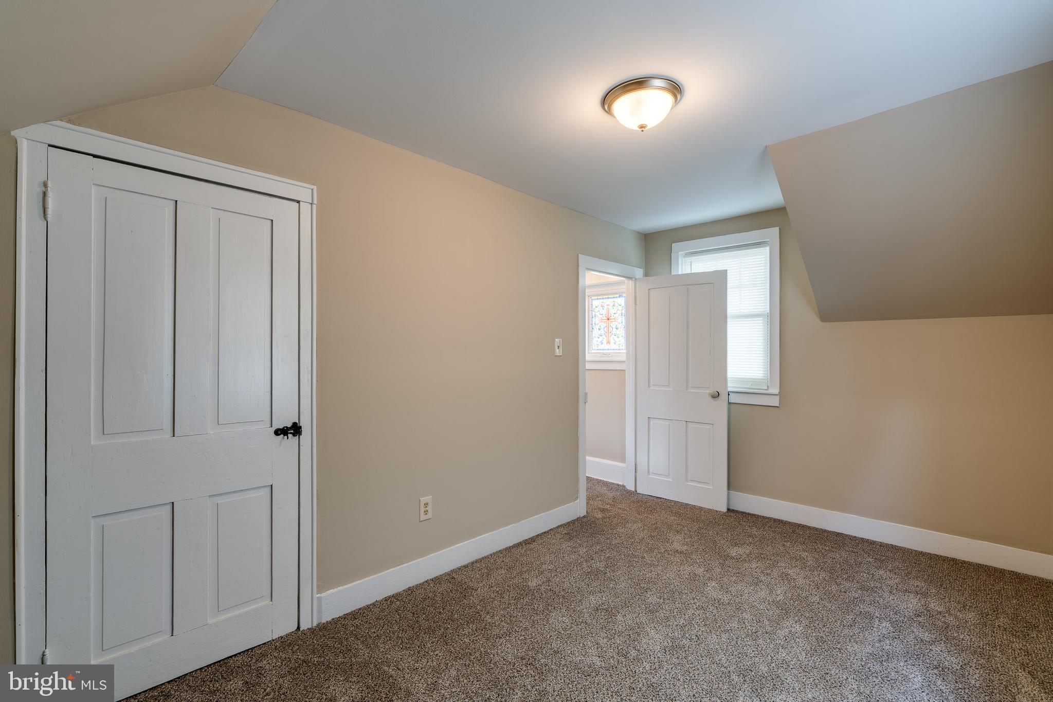 309 South Cherry Street Manheim, PA 17545 - Photo 25 of 34 an empty room with windows and closet
