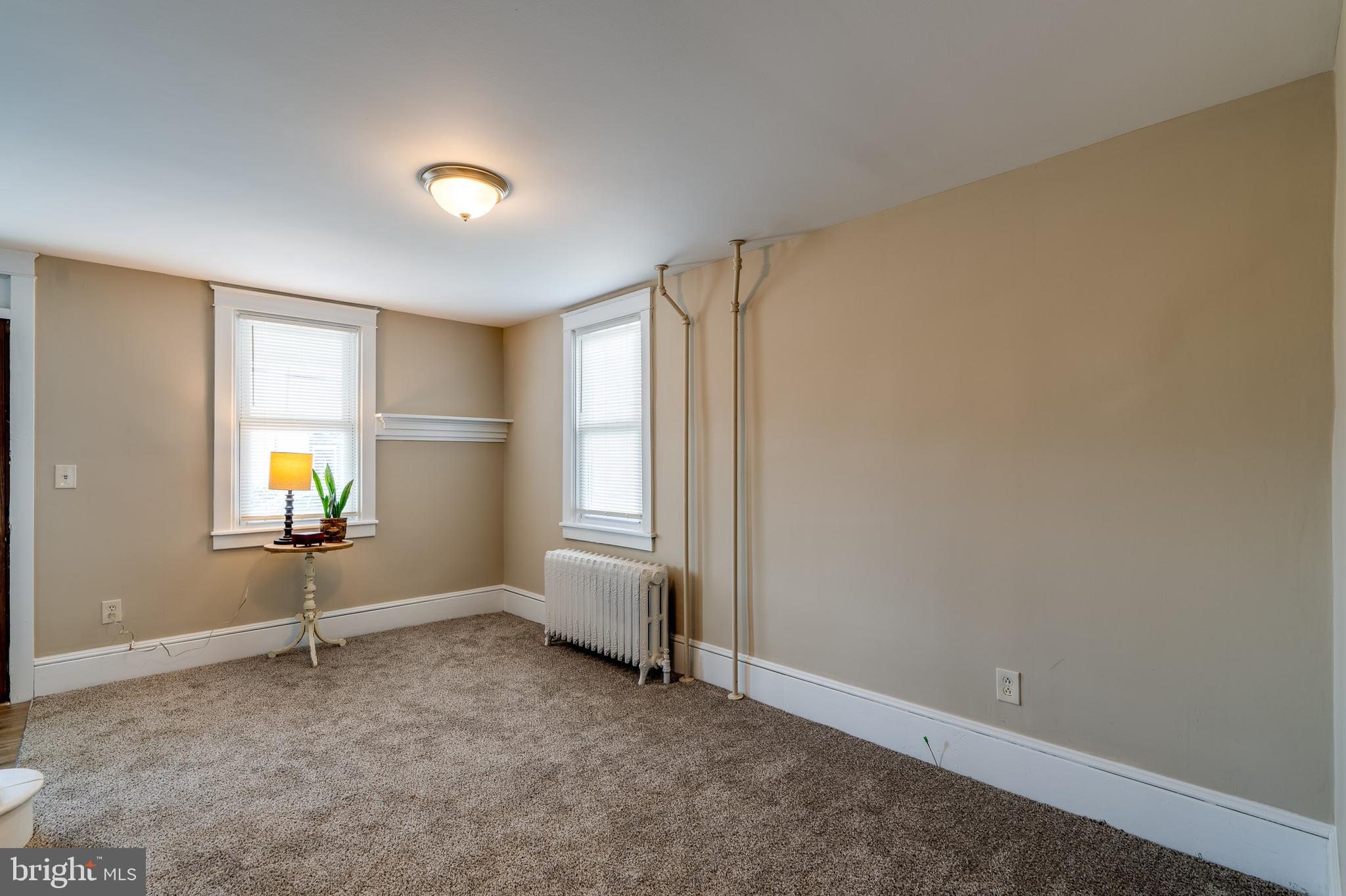 309 South Cherry Street Manheim, PA 17545 - Photo 9 of 34 an empty room with windows