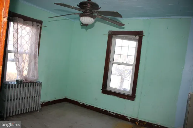 a view of a hallway with entryway