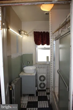 a view of a door and chair in a room