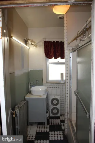 a view of a door and chair in a room