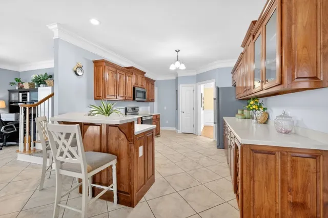 a view of a kitchen and dining room