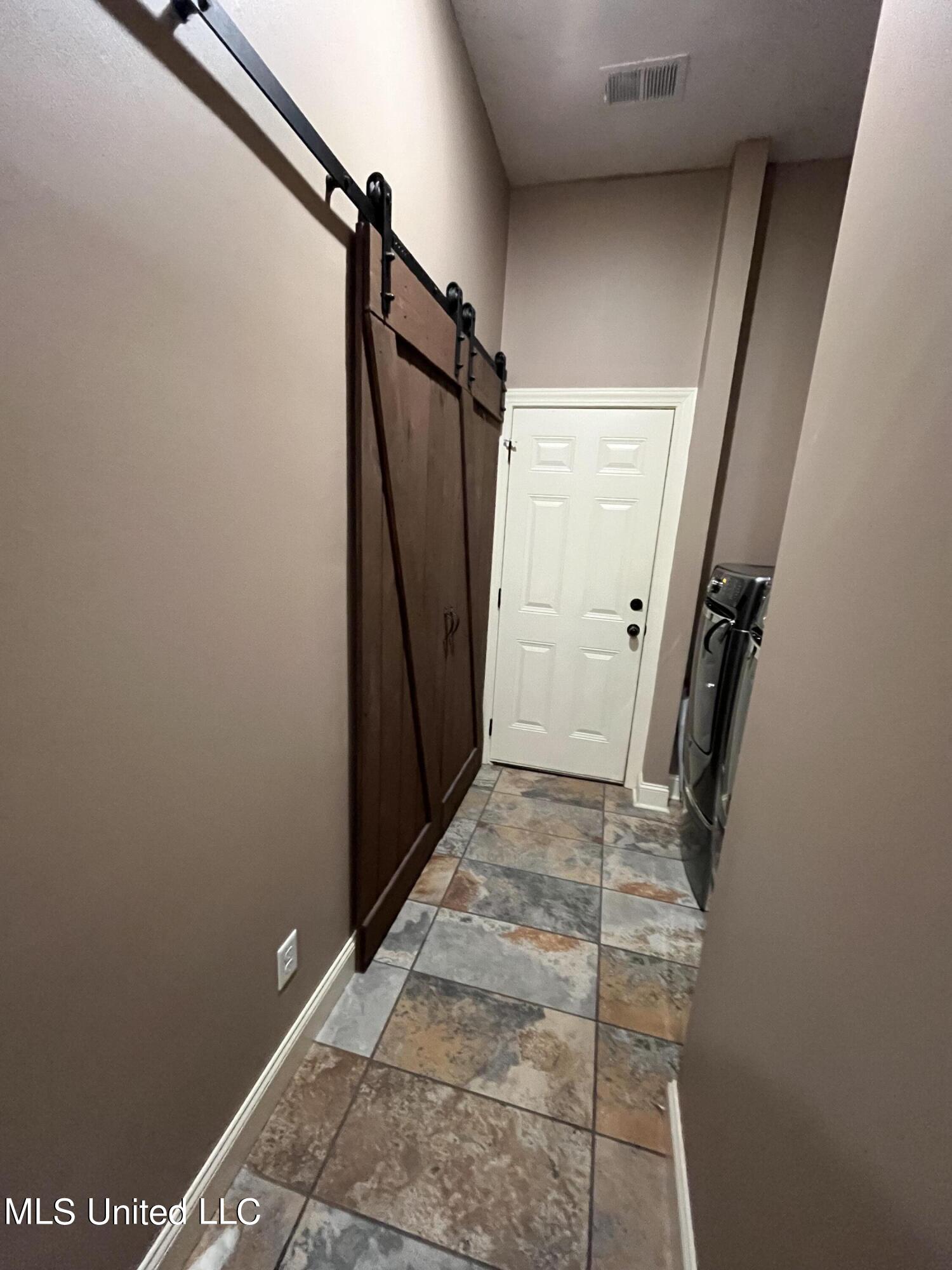 1716 Gwynn Road Nesbit, MS 38651 - Photo 31 of 59 Hallway to Garage