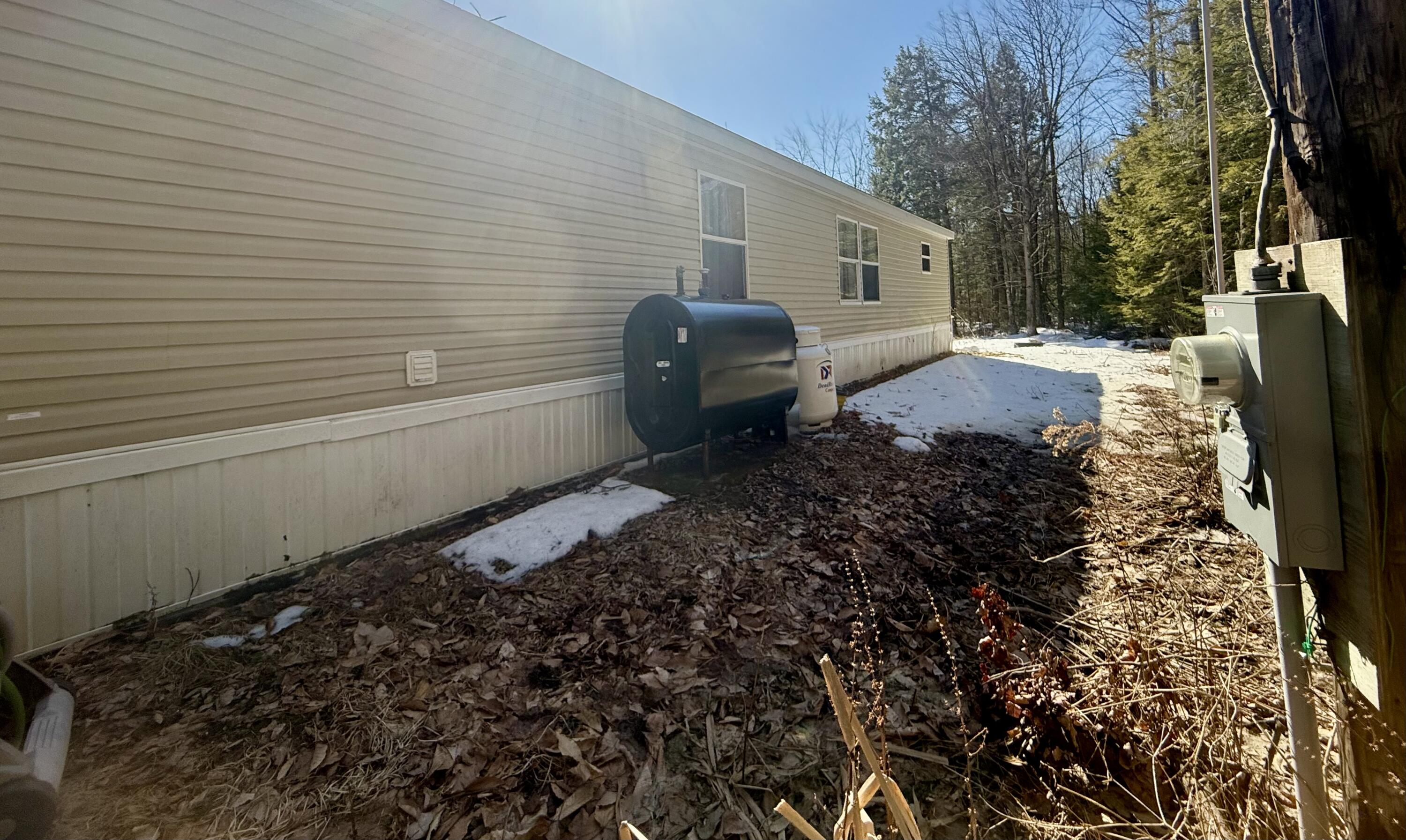 132 Goodhue Road Sidney, ME 04330 - Photo 18 of 25 19. Back of home oil tank