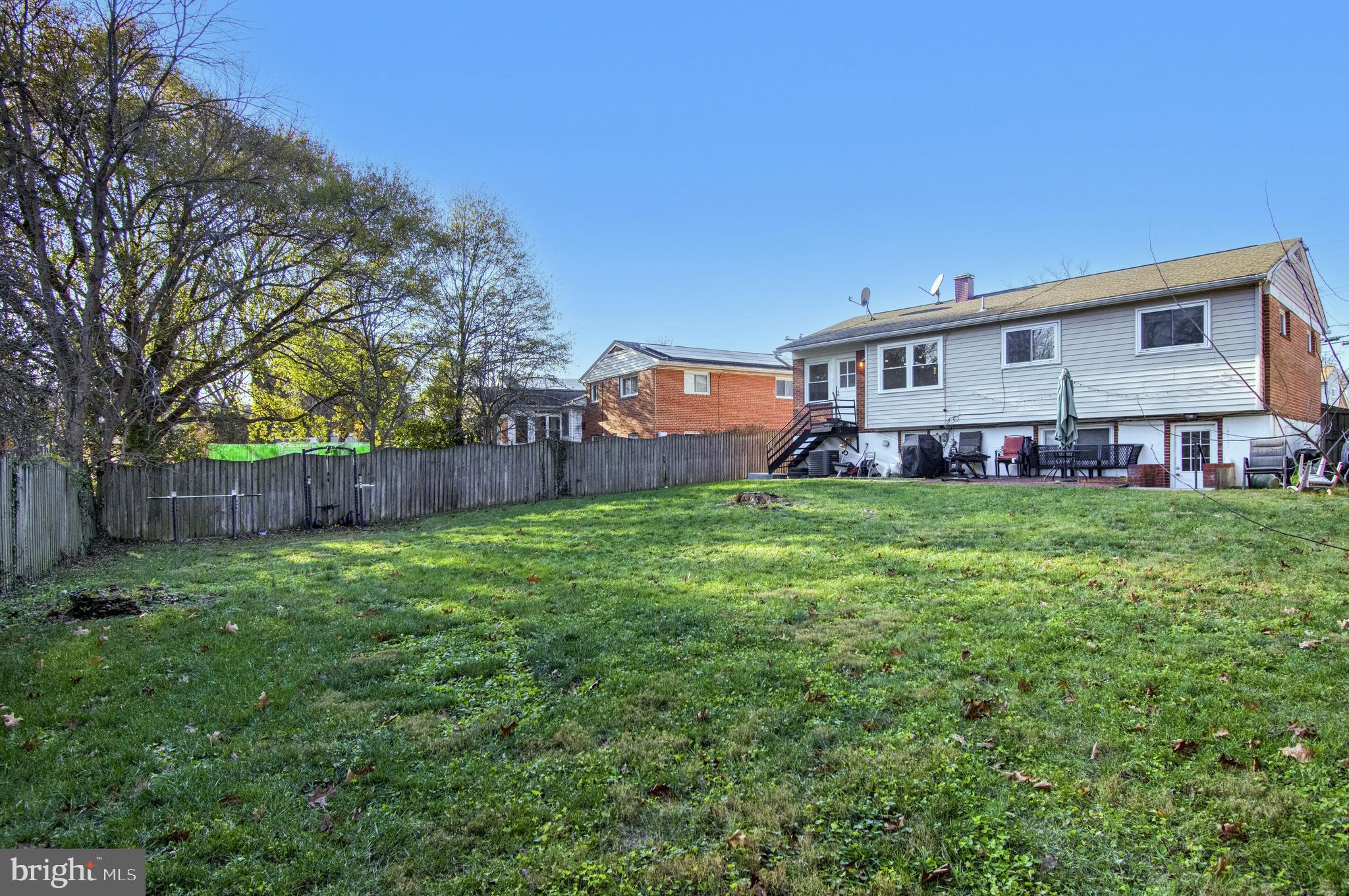 1104 Caddington Avenue Silver Spring, MD 20901 - Photo 22 of 23 a front view of house with yard and green space