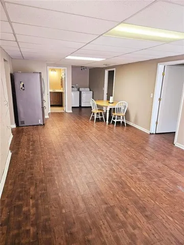 a view of the ocean with a building in the background