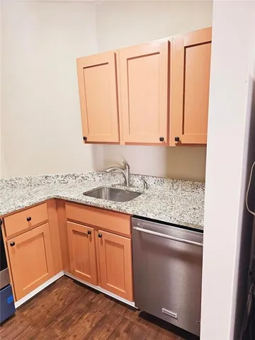 a view of a livingroom with furniture and window