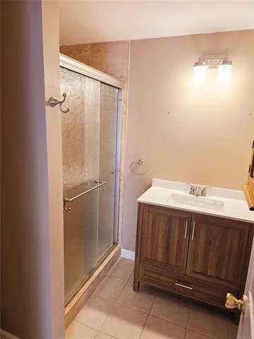a bathroom with a tub and a shower