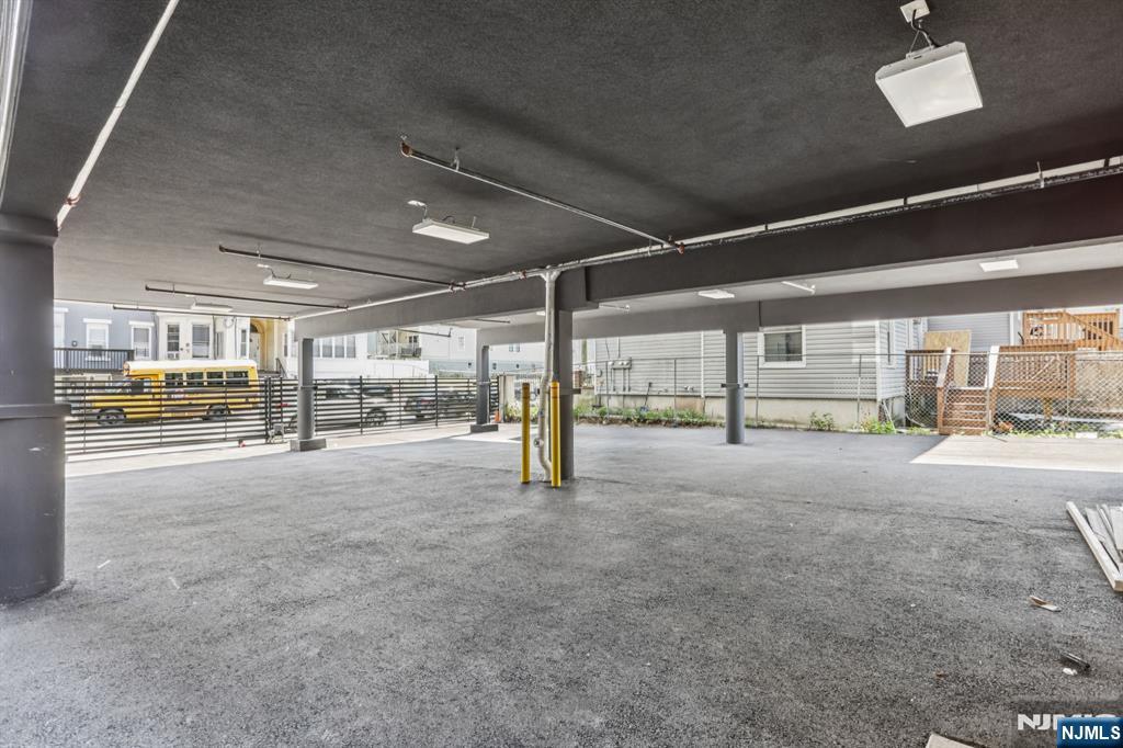 200-202 Summer Street, Unit 3 Paterson, NJ 07501 - Photo 12 of 12 a big room with lots of traffic signal lights