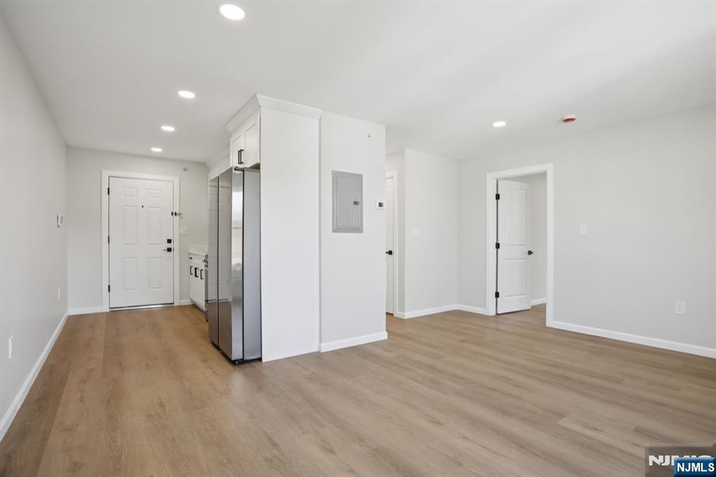 200-202 Summer Street, Unit 3 Paterson, NJ 07501 - Photo 4 of 12 a view of an empty room with wooden floor