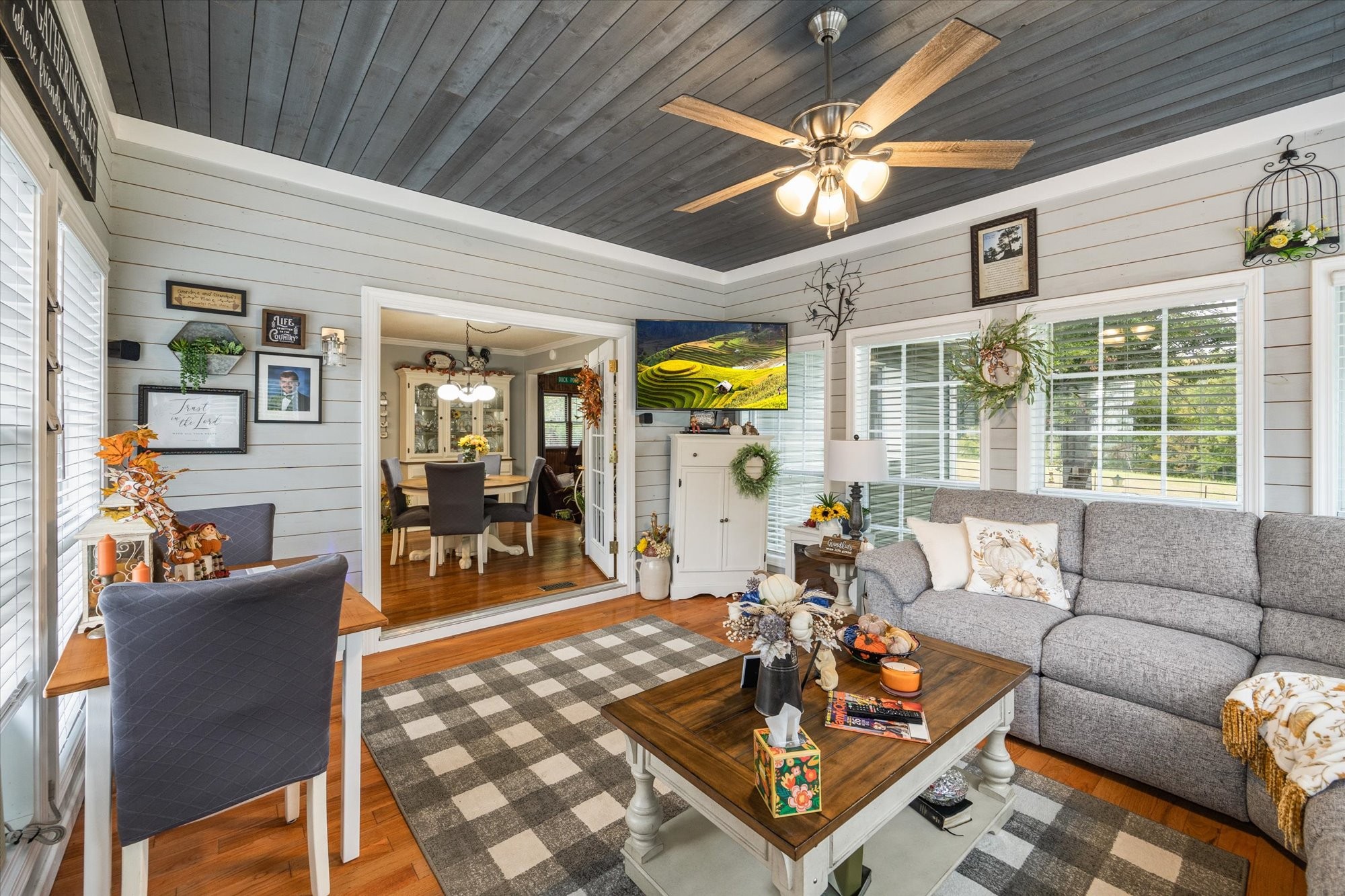 7214 Sarah Thomas Road Silver Point, TN 38582 - Photo 13 of 52 a living room with furniture a dining table and a large window