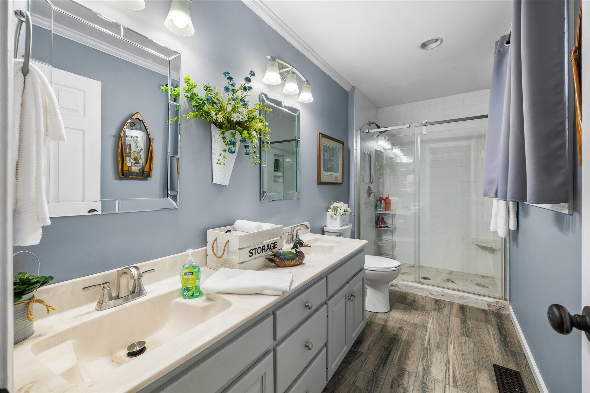 7214 Sarah Thomas Road Silver Point, TN 38582 - Photo 16 of 52 a bathroom with a sink double vanity mirror and a bathtub