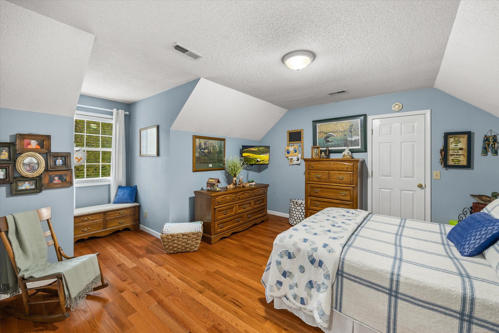 7214 Sarah Thomas Road Silver Point, TN 38582 - Photo 21 of 52 a bedroom with a bed and furniture