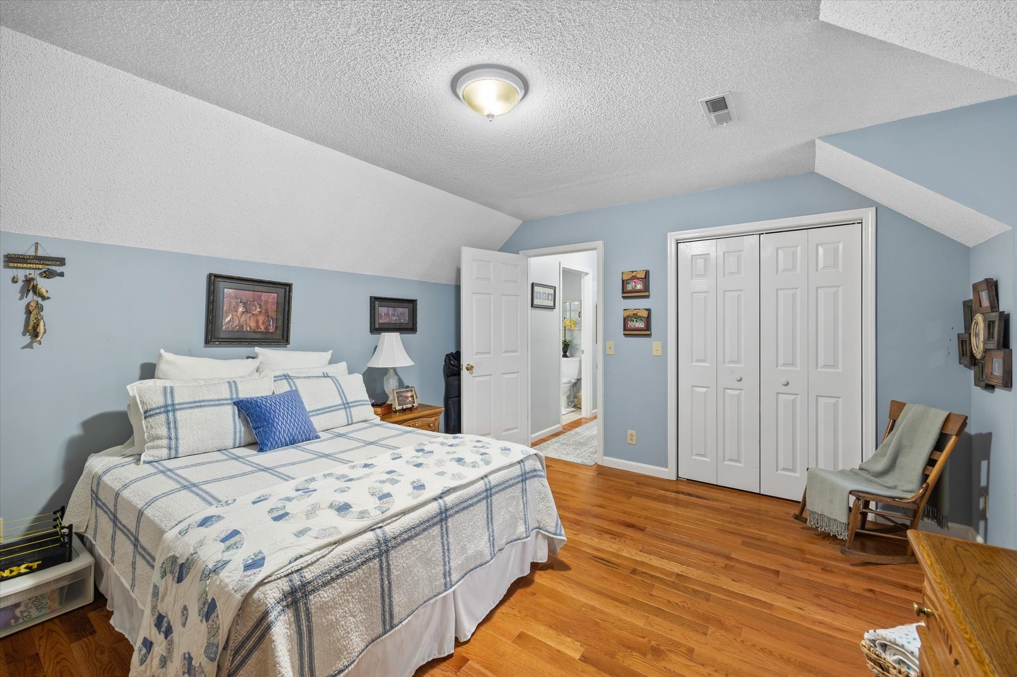 7214 Sarah Thomas Road Silver Point, TN 38582 - Photo 22 of 52 a bedroom with a bed and furniture