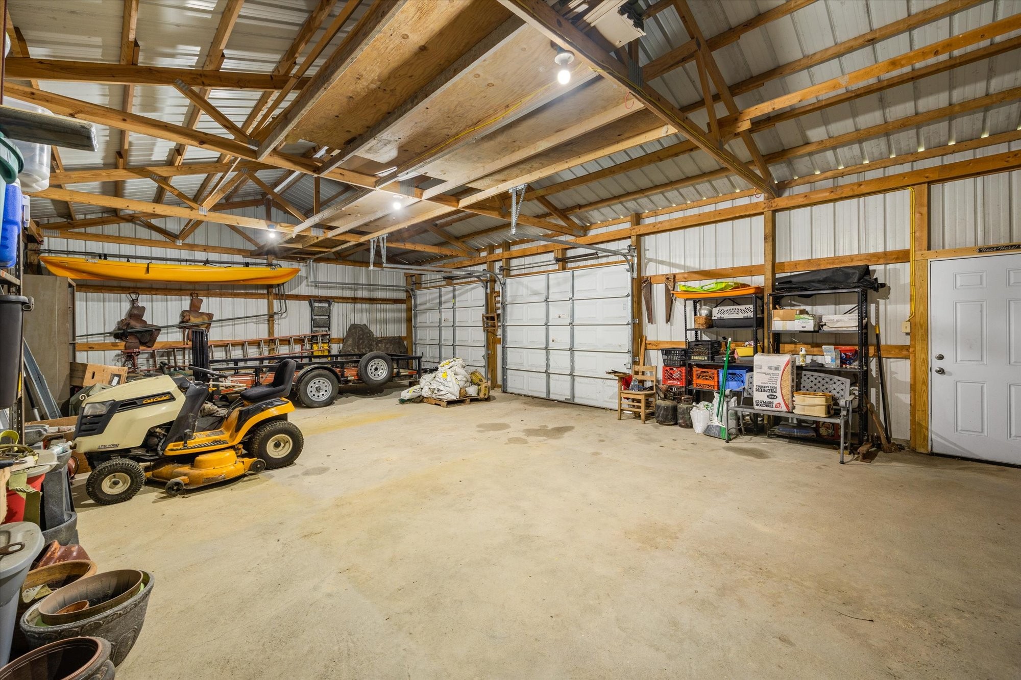 7214 Sarah Thomas Road Silver Point, TN 38582 - Photo 24 of 52 a view of a garage with cars