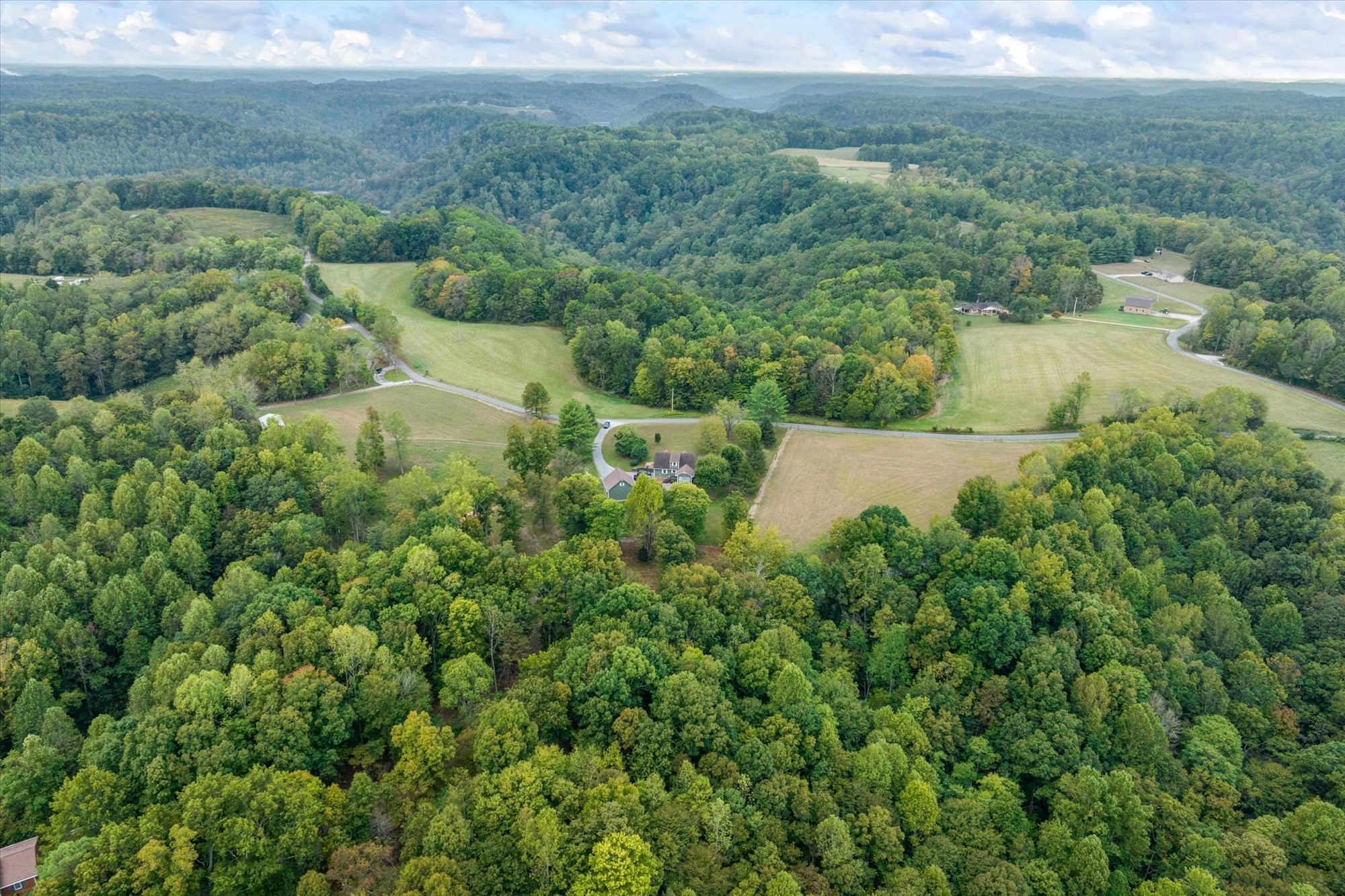 7214 Sarah Thomas Road Silver Point, TN 38582 - Photo 33 of 52 an aerial view of residential house with outdoor space