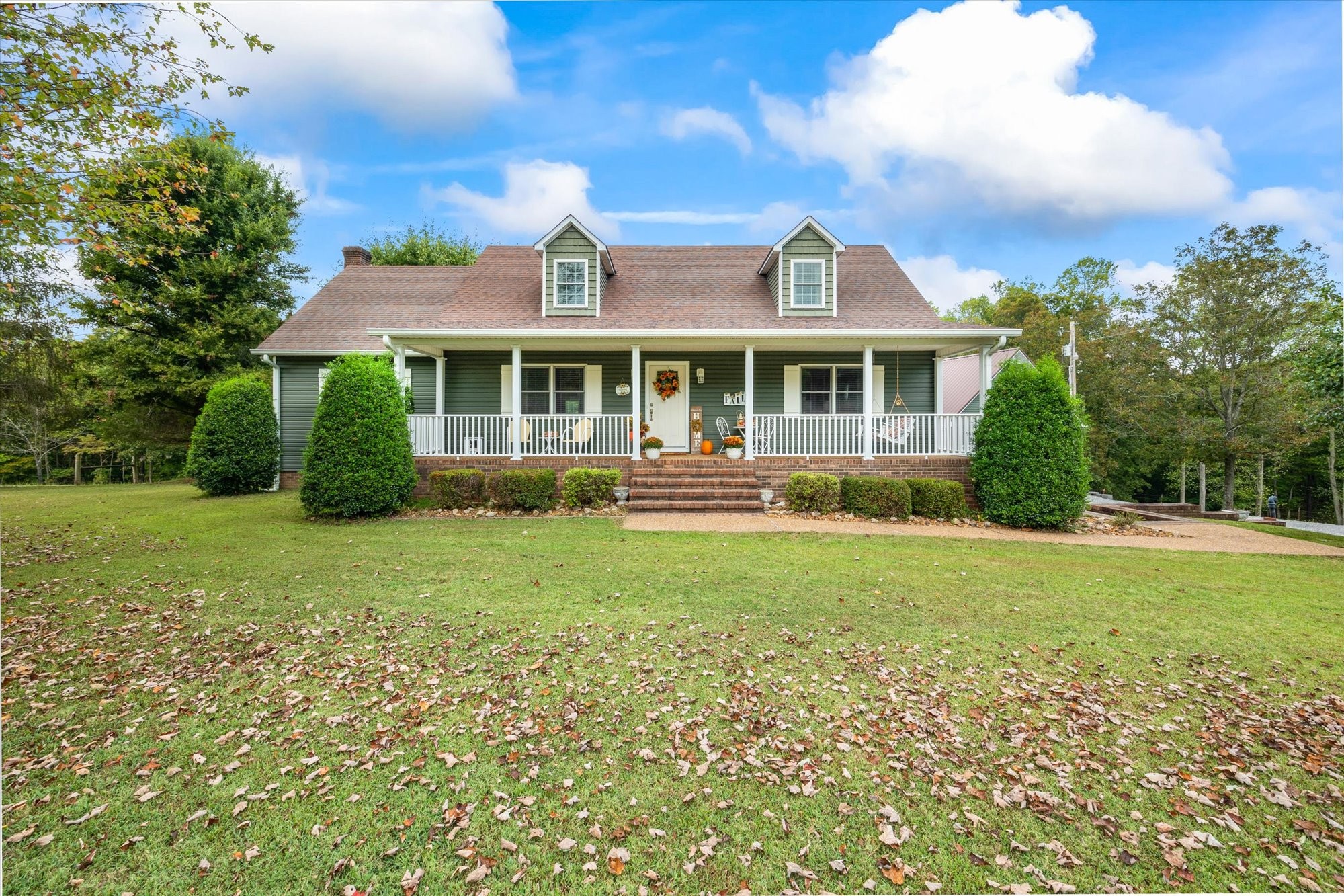 7214 Sarah Thomas Road Silver Point, TN 38582 - Photo 41 of 52 a front view of house with yard and green space