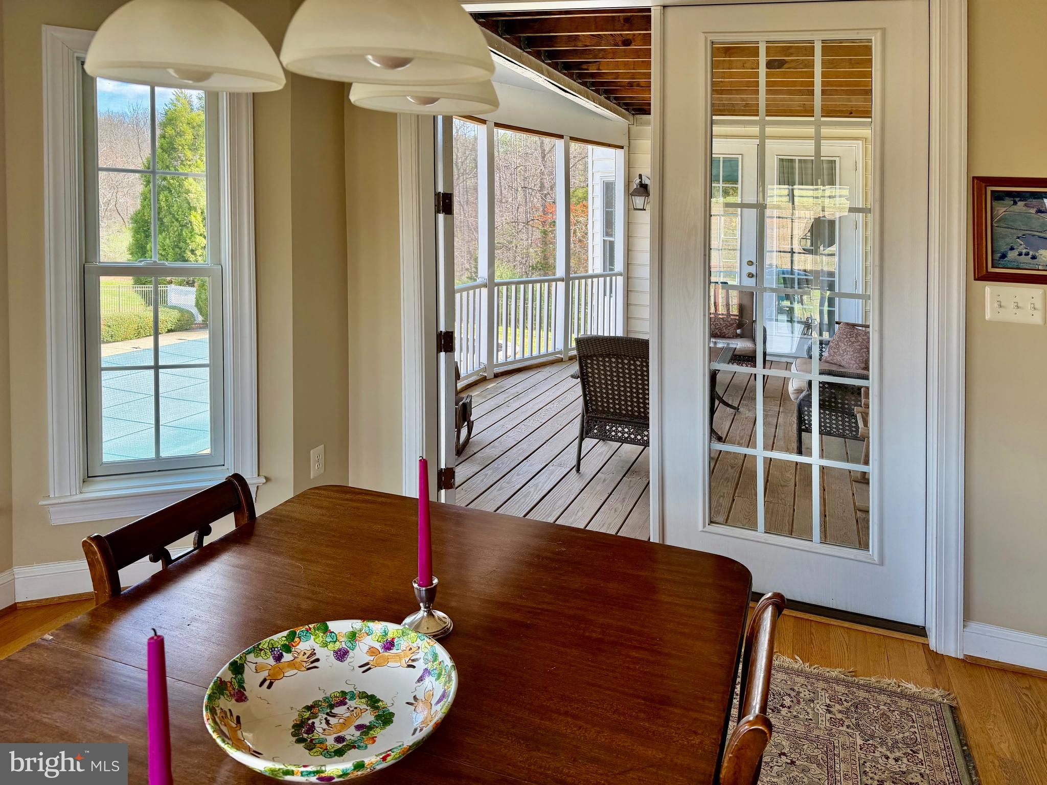 6277 Griffinsburg Road Reva, VA 22735 - Photo 8 of 20 Dining room to screened porch