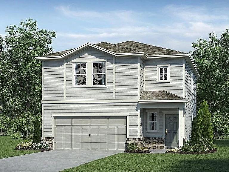 115 Wynn Way Pendergrass, GA 30567 - Photo 1 of 22 a front view of a house with a garden and yard