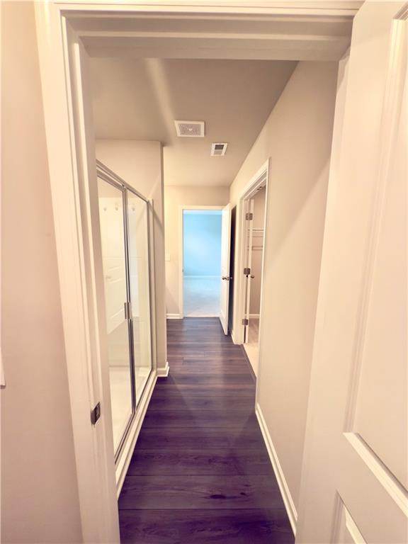 115 Wynn Way Pendergrass, GA 30567 - Photo 19 of 22 a view of a hallway with wooden floor