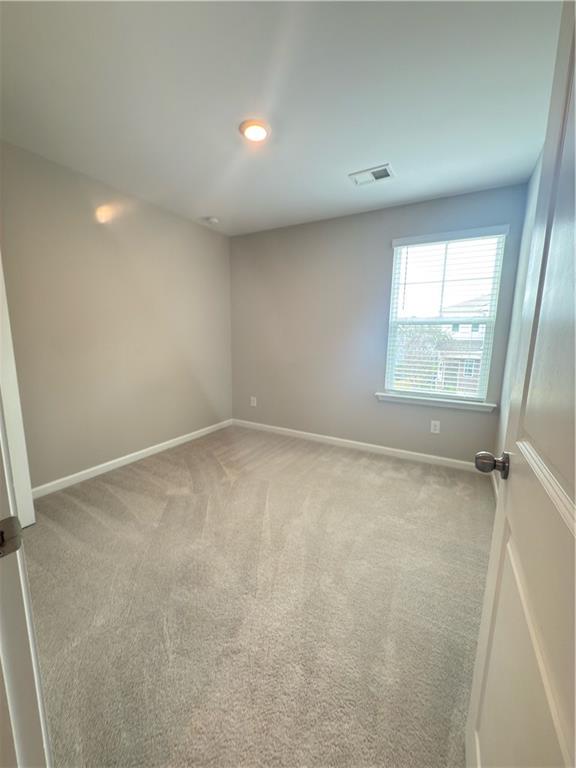 115 Wynn Way Pendergrass, GA 30567 - Photo 20 of 22 an empty room with a window