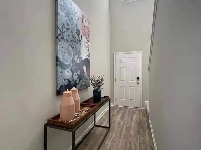 a bathroom with a sink a mirror and vanity