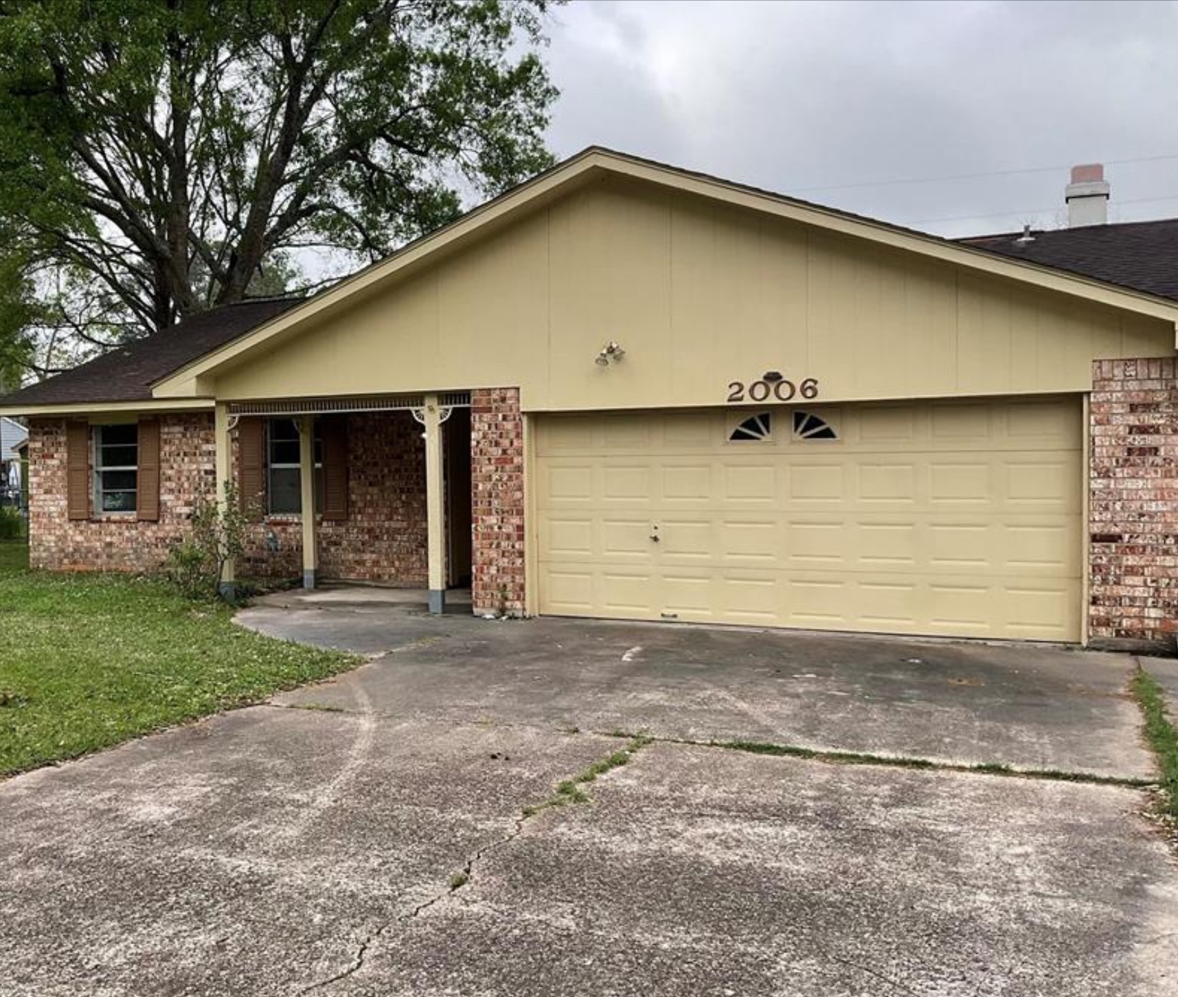 2006 Chester Street Dayton, TX 77535 - Photo 1 of 10 a front view of house with yard