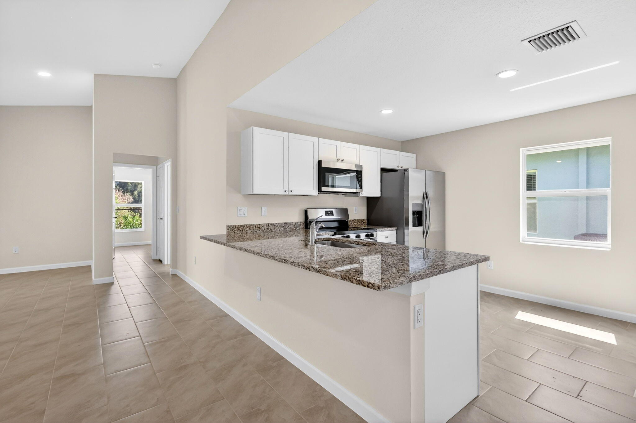 134 Southwest Seminole Crossing Southwest Indiantown, FL 34956 - Photo 3 of 27 134 KITCHEN 1
