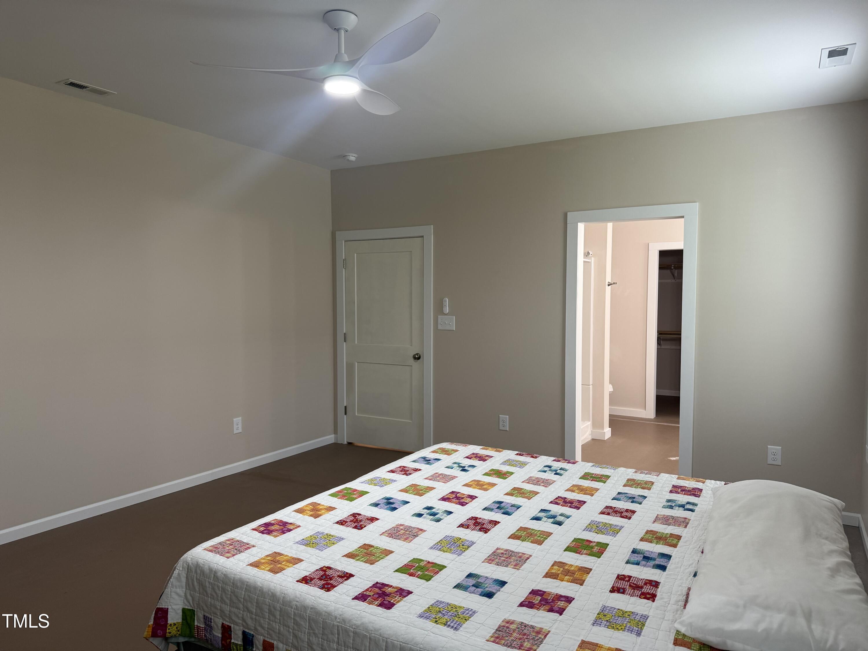 405 Sam Allen Road Roper, NC 27970 - Photo 20 of 32 a bedroom with a bed and a window