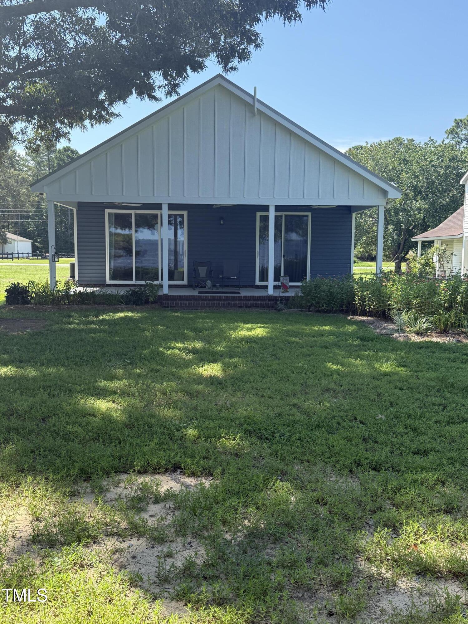 405 Sam Allen Road Roper, NC 27970 - Photo 25 of 32 a house view with a garden space