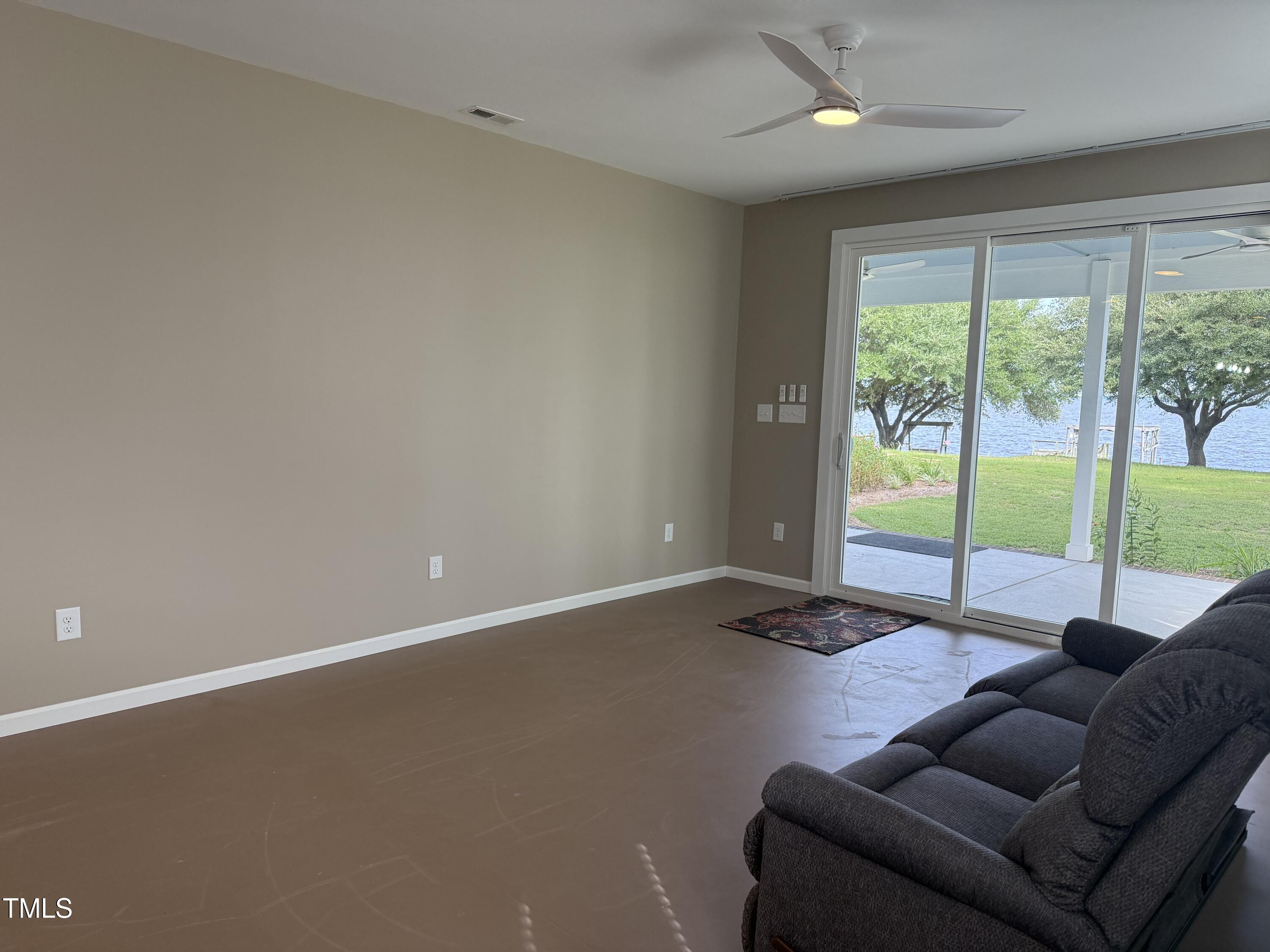 405 Sam Allen Road Roper, NC 27970 - Photo 10 of 32 a room with furniture and a large window