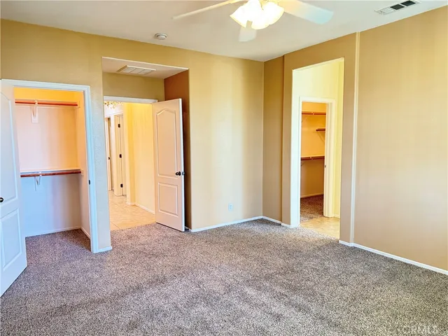 an empty room with a bathroom