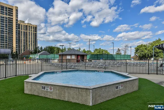 a view of a patio with a table and a chairs